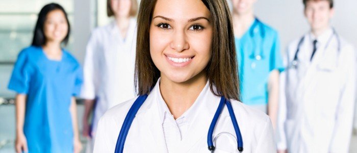 Clinical/Medical Assistant smiling and wearing a stethoscope.